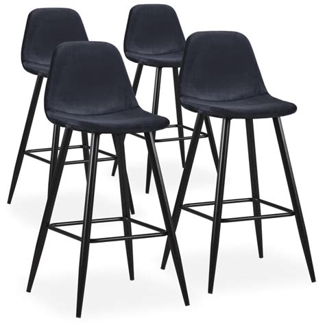 Les chaises de bar sont parmi les meubles les plus importants dans la cuisine avec bar car, selon leur forme, leur style et leur matériau de fabrication, elles peuvent complètement changer son aspect. Lot de 4 Chaises de Bar Velours "Yan" 100cm Noir