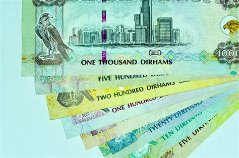 Close Up United Arab Emirates Currency Dirhams And Fils Dubai Abu