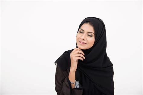 Young Pretty Arab Girl In Traditional Dress Setting On The Floor Stock