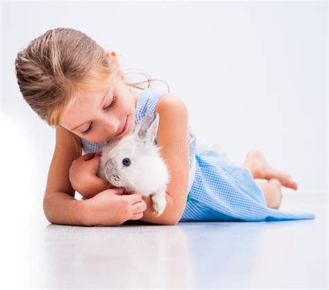 Cute Little Girl A White Rabbit Stock Photo Image Of Caucasian