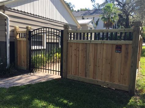 This color would have been chosen in the 1930s when the nicolsons created the garden, as a nod above: wood privacy fence with metal inserts and metal gate ...