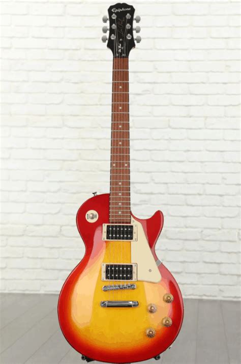 The epiphone les paul 100 guitar features classic les paul design and tone. Epiphone Les Paul 100 Cherry Sunburst Review - MusicCritic