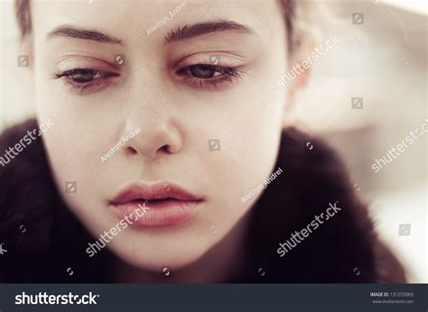 Portrait Of A Beautiful Sad Girl Closeup Stock Photo 131255069