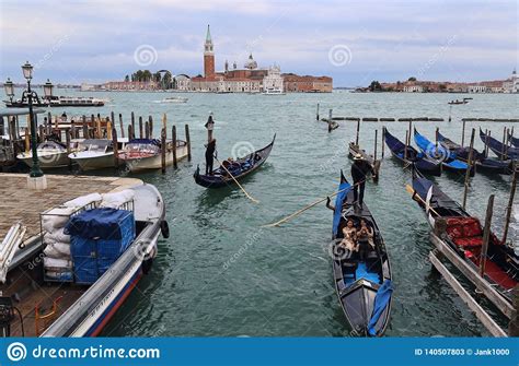 Gondolas And San Giorgio Maggiore Islannd In Venice Italy Editorial
