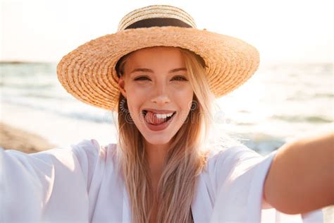 Photo Of Joyous Blonde Woman 20s In Summer Straw Hat Smiling An Stock