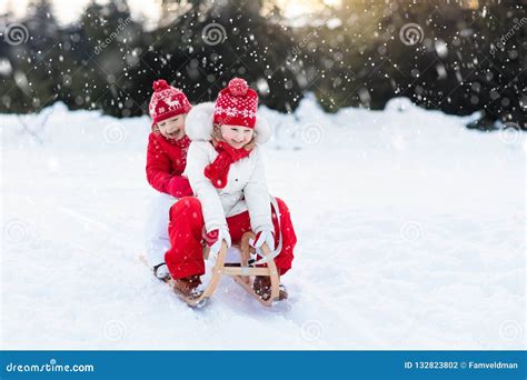 Kids On Sleigh Children Sled Winter Snow Fun Stock Photo Image Of