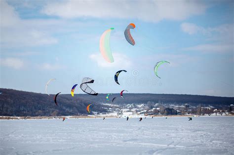 This is snow kiteboarding by gnarly tv on vimeo, the home for high quality videos and the people who love them. Snow Kiting On A Snowboard On A Frozen Lake Stock Photo ...