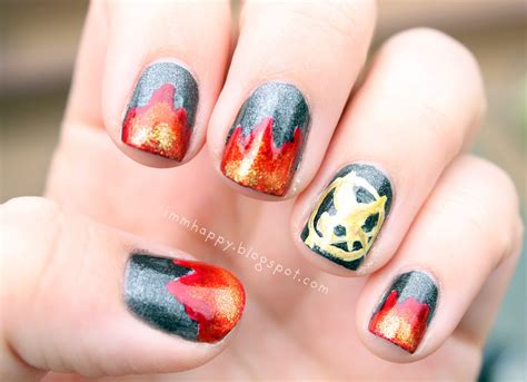 Here Comes The Sun Hunger Games Manicure