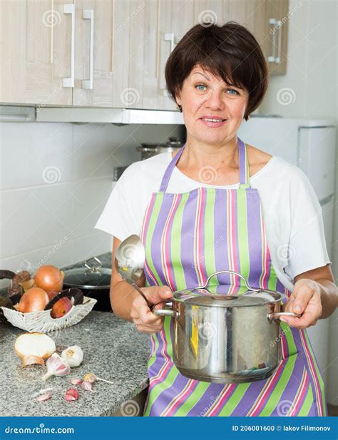 Mature Woman Kitchen Soup Stock Photo Image Of Enjoyment 206001600