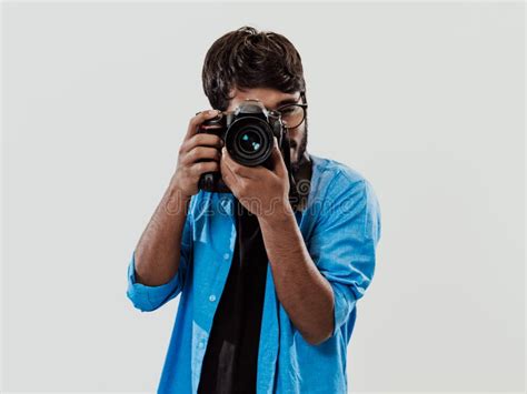Professional Photographer Having Dslr Camera Taking Pictureindian Man