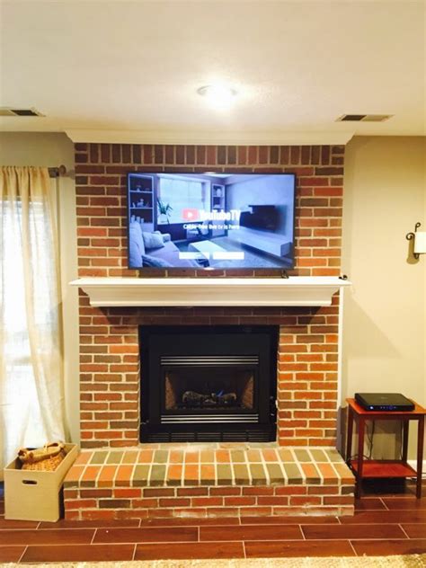 Tv Mounted On A Brick Fireplace In Lexington Kentucky Platinum Audio