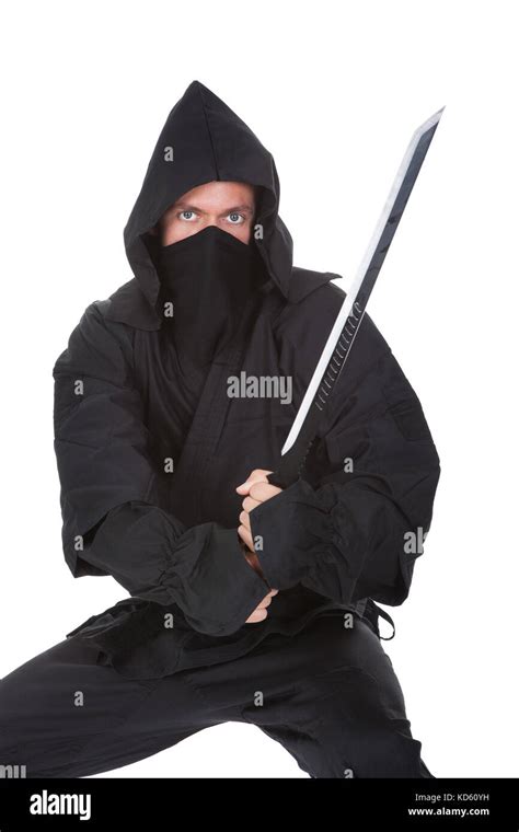 Portrait Of Male Ninja With Weapon Isolated Over White Background Stock