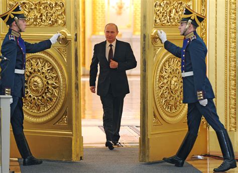 Vladimir Putin Enters The St George Hall At The Grand Kremlin Palace