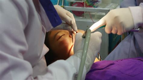 Asian Girl At The Dentist Has Tooth Treated Stock Video Footage 00 16 Sbv 307270727 Storyblocks