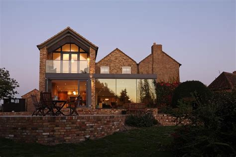 Modern Glass Addition To Otherwise Traditional Home