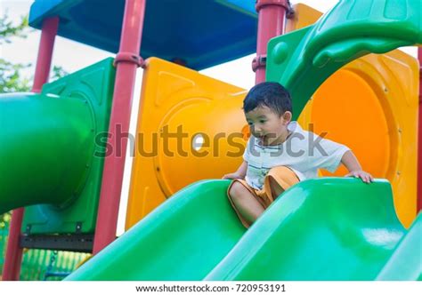 Little Asian Kid Playing Slide Playground Stock Photo 720953191