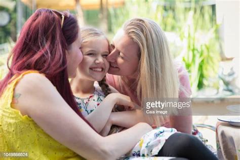 Lesbian Girls Kissing Mom Photos And Premium High Res Pictures Getty