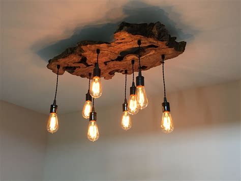 Rustic industrial lighting for your home, bar or restaurant. Handmade Live-Edge Olive Wood Chandelier. Rustic And ...