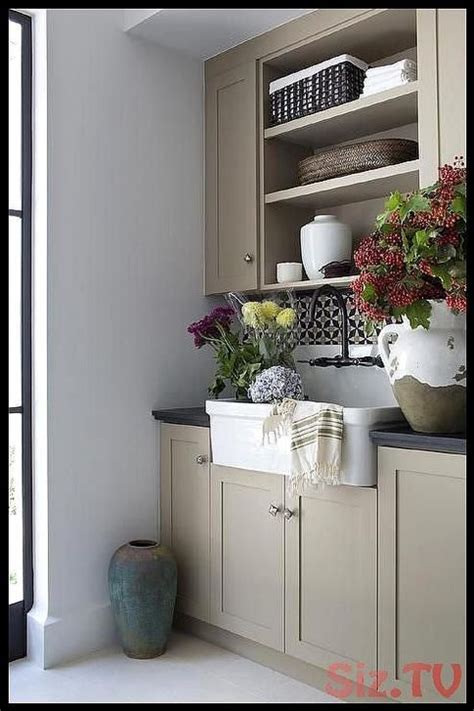 Part of the problem with your kitchen is how narrow it is, small window and wall cabinets snugged right up to the window. 47 Elegant Honed Black Granite Countertop Ideas For Awesome Kitchen | Tan kitchen cabinets ...