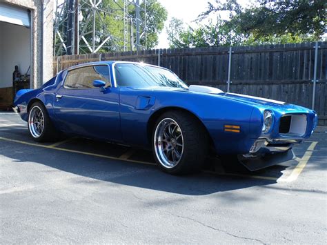 Positive economic reports provide a slight lift. Very nice '72 Trans Am, built by Griffith Metal Shaping ...