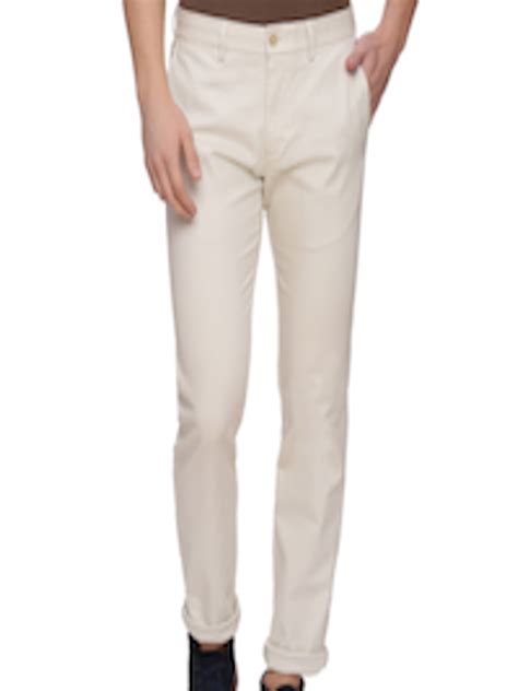 Buy Basics Men Beige Tapered Fit Solid Chinos Trousers For Men Myntra