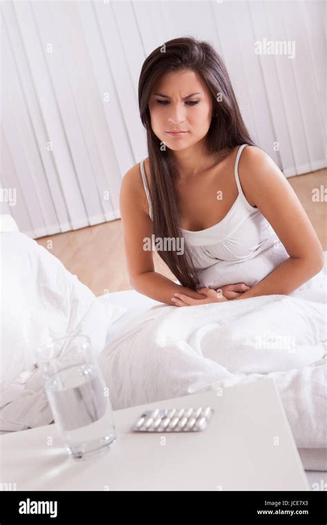 Woman And Tummy Ache With Pills Hi Res Stock Photography And Images Alamy