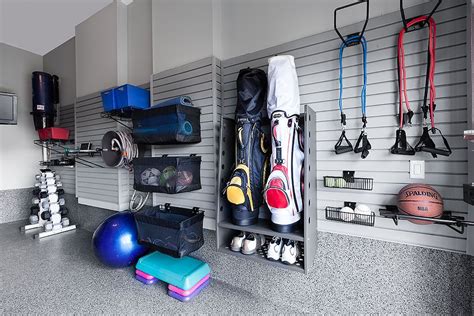 Out of all garage gym essentials you need if you want the best home gym possible, this is it. Sports equipment neatly organized on a garage wall using a ...
