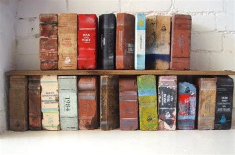Bricks Painted To Look Like Old Books To Use As Bookends