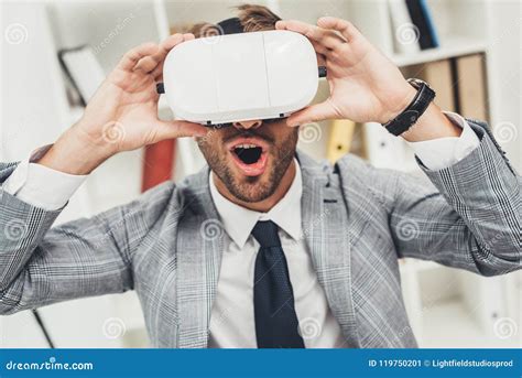 Expressed Young Businessman In Vr Headset Sitting Stock Image Image Of Adult Person 119750201