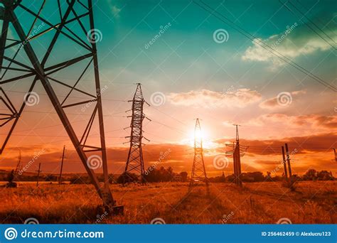 Tower And High Voltage Power Line At Sunset Stock Image Image Of