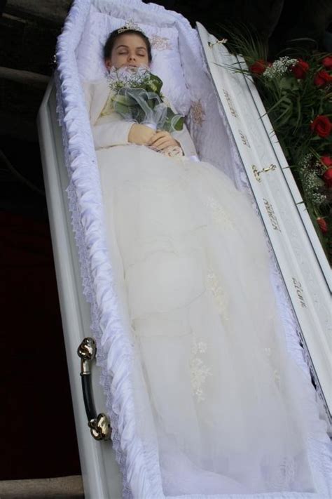 Andreea Brazovan In Her Open Casket During Her Burial Poster