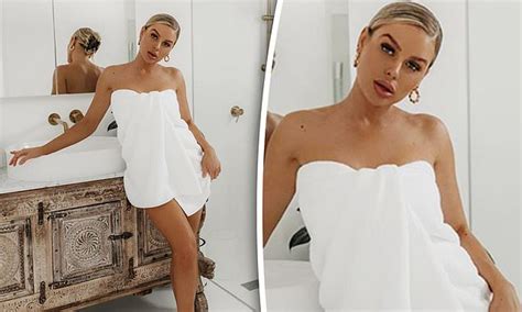 Skye Wheatley Puts On A Leggy Display As She Poses In Nothing But A Crisp White Towel