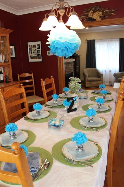 26 of 26 a combination of florals―a pretty quilt repurposed as a tablecloth; Simple, elegant table setting for baby boy's Christening ...