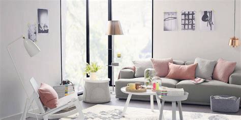 Pink and gray living room boasts a blush pink velvet vintage chair with gray block print pillow and a dove gray sofa with pink and gray pillows. Home Inspiration: Decorating with Blush Pink