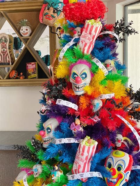 You'll need a wreath form, a roll of raffle tickets, fake blood, mini skeletons and clown accessories. Creepy Carnival Clowns DIY Halloween Tree Ornaments - Jennifer Perkins
