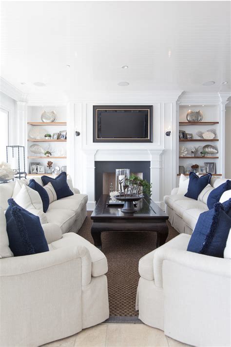 A white coastal living room with white furniture and curtains, a tan rug and a suspended ship. 30 Living Room Furniture Design You Love To Try - Decoration Love