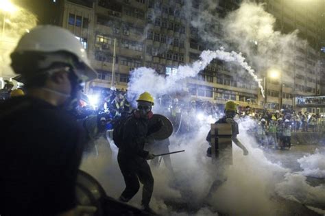 Riot Police Fired Tear Gas At Protesters In Hong Kong Following A Large