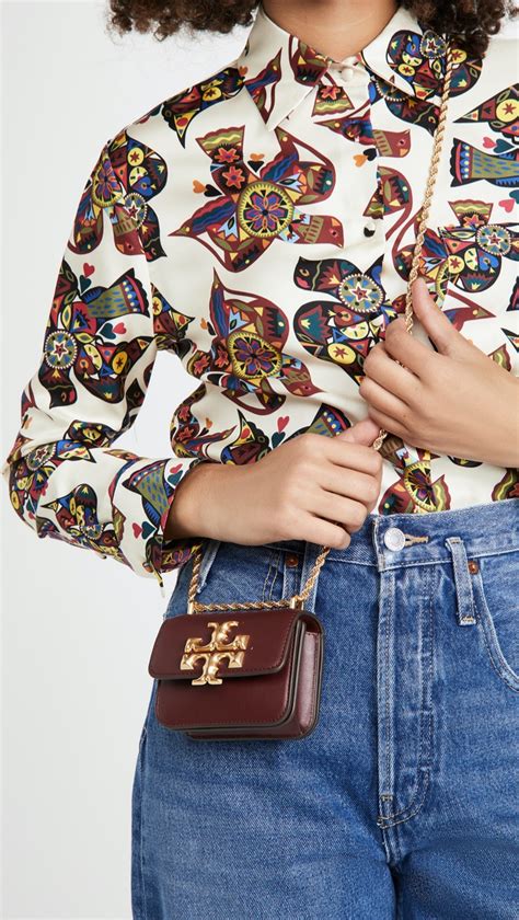 L 9 x w 5 x h 7 this is a paper shopping bag covered in pvc (polyvinyl chloride or vinyl) pvc material is water resistant and durable. Tory Burch Fall 2020 Clothing, Bags Shop | Fashion Gone Rogue