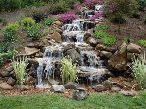 Learn how to build your own outdoor pond as we construct one in two days. pictures backyard waterfalls | Waterfalls Without Ponds ...