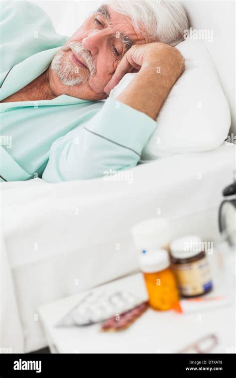 Elderly Man Waking Up Stock Photo Alamy