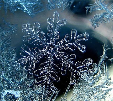 A Snowflake Is Seen Through The Ice