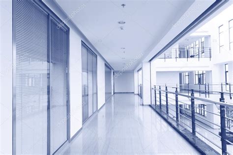 Corridor In Office Building With Big Windows Passing Daylight Stock