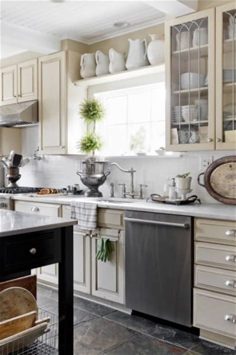 It'll help balance out a sleek and modern kitchen. decorating above kitchen cabinets {10 ways}