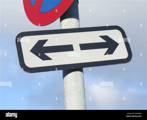 Traffic Sign Two Arrows Pointing Hi Res Stock Photography And Images