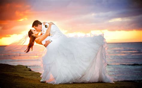 Just Married Loving Couple Bridal In Uniform Young Woman In Wedding Dress Sunset Beach Romantic