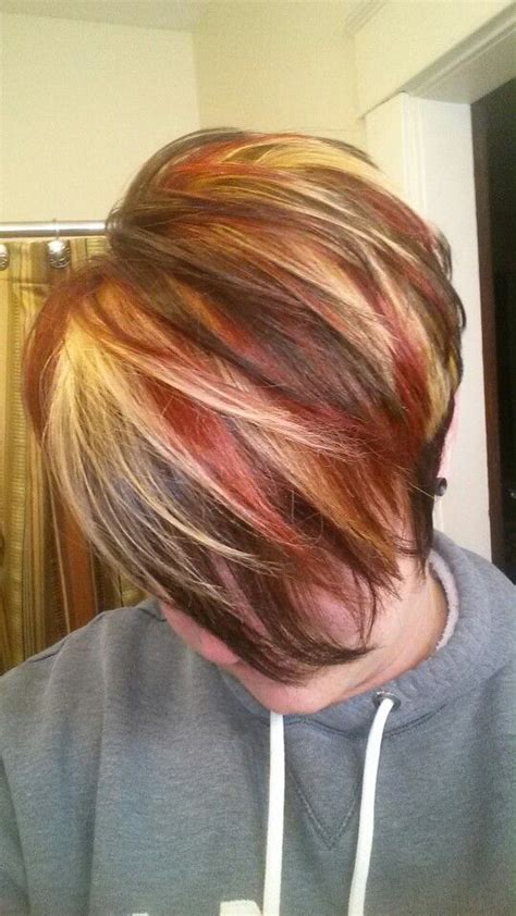 Lowlighting means darker strands are woven into the lighter ones. Multicolored highlights red blonde highlights brown ...