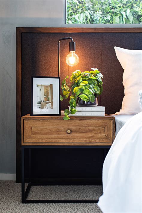 Your Bedside Tables Should Be Sisters Not Twins Bedside Table Decor