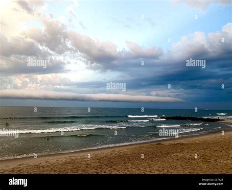 Rolling Cloud Over Ocean Stock Photo Alamy
