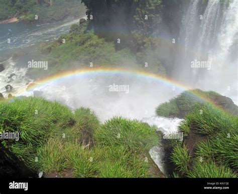 Rainbow Over Iguazu Falls Stock Photo Alamy