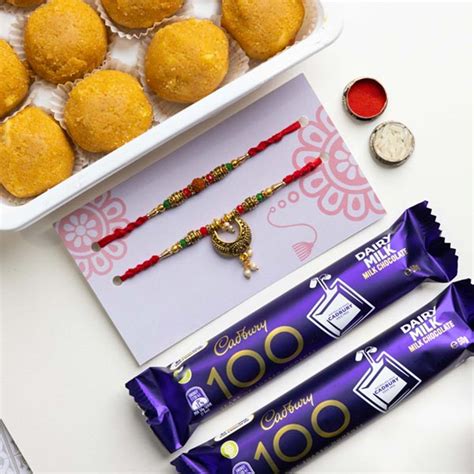 Send Bhaiya Bhabhi Rakhi With Sweets Chocolates Online